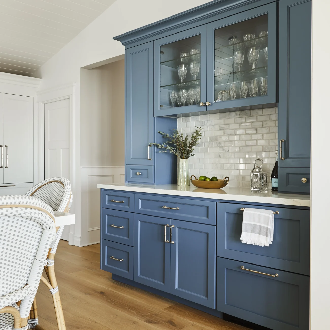 Christine Vroom Interiors Vigilance | Kitchen with hardwood floors and blue cabinets