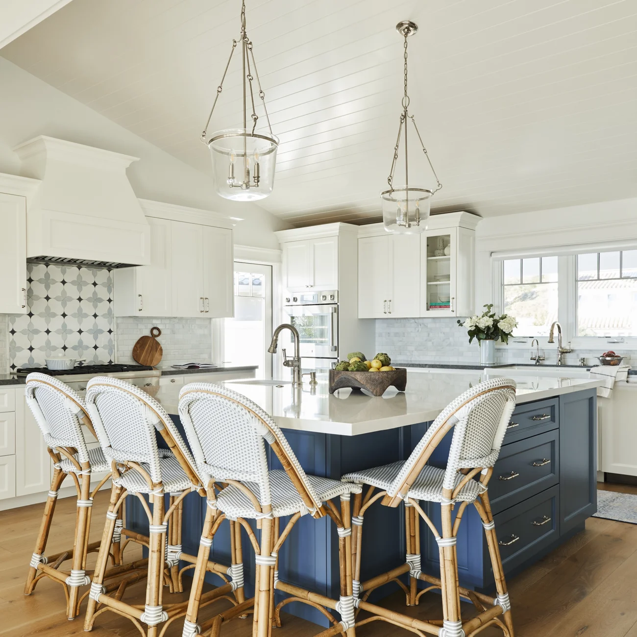 Christine Vroom Interiors Vigilance | Kitchen with hardwood with white and blue accent cabinets