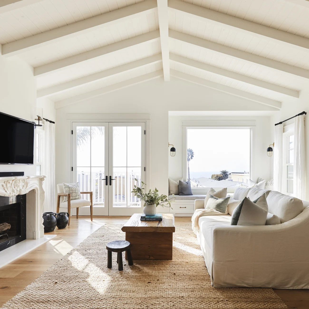 Christine Vroom Interiors | Gentry | Bright, white living room with vaulted ceilings