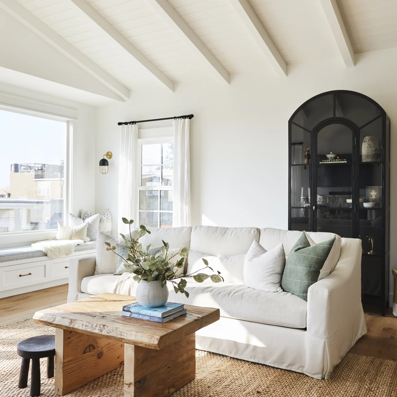 Christine Vroom Interiors | Gentry | Bright, white living room with vaulted ceilings