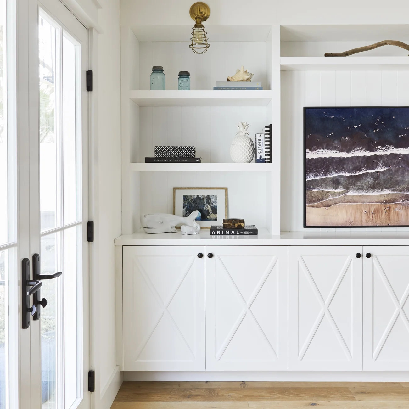 Christine Vroom Interiors | Gentry | Bright, white, Costal living room with built-in cabinets
