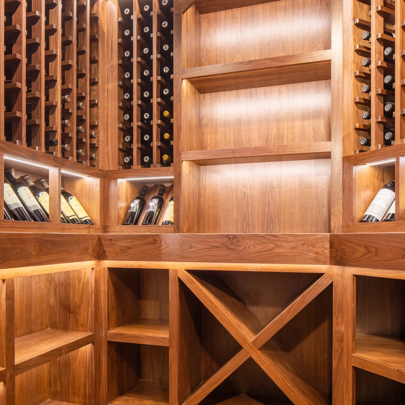 Christine Vroom Interiors Strawberry Lane | Wooden Wine cellar with backlit acloves