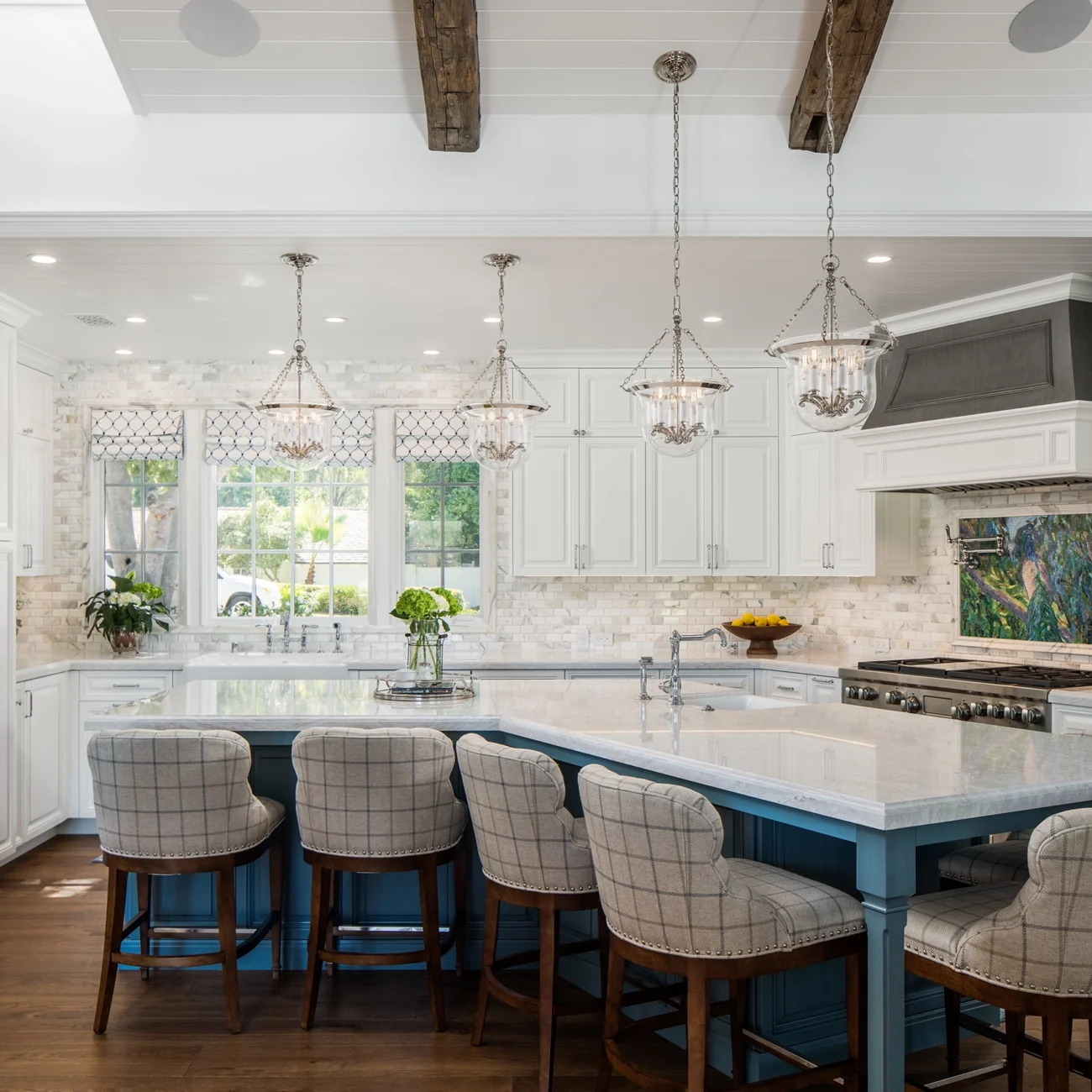 Christine Vroom Interiors Strawberry Lane | Traditional kitchen with plain bar seats, exposed beams, blue accent cabinets and hardwood flooring