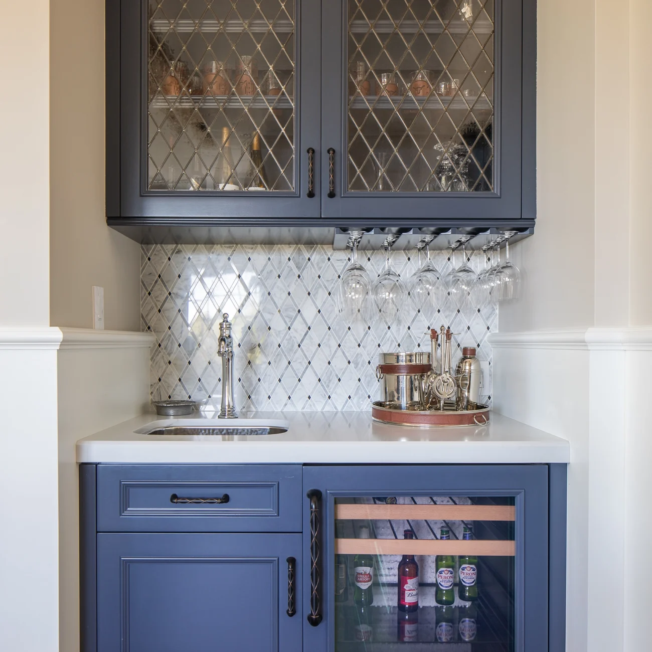 Christine Vroom Interiors Strawberry Lane | Traditional wet bar alcove with blue cabinetry and drink cooler