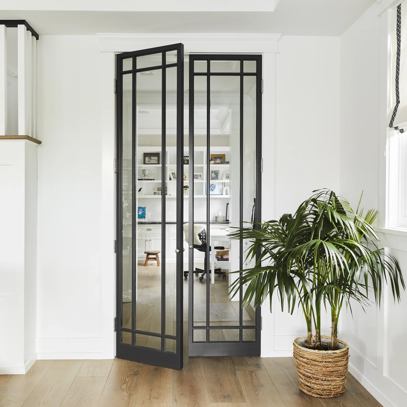 Christine Vroom-Interiors Thayer | Traditional black framed glass doors