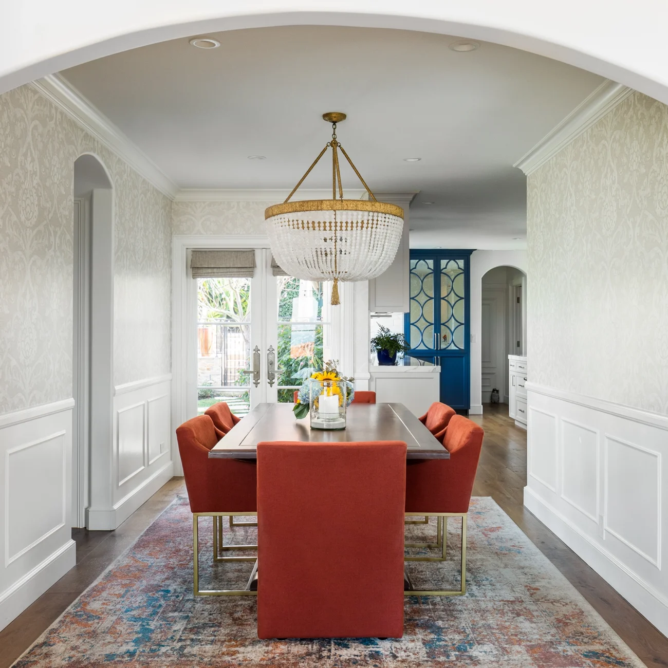 Christine Vroom Interiors | Via-Arriba | Brightly colored dining room with chandelier