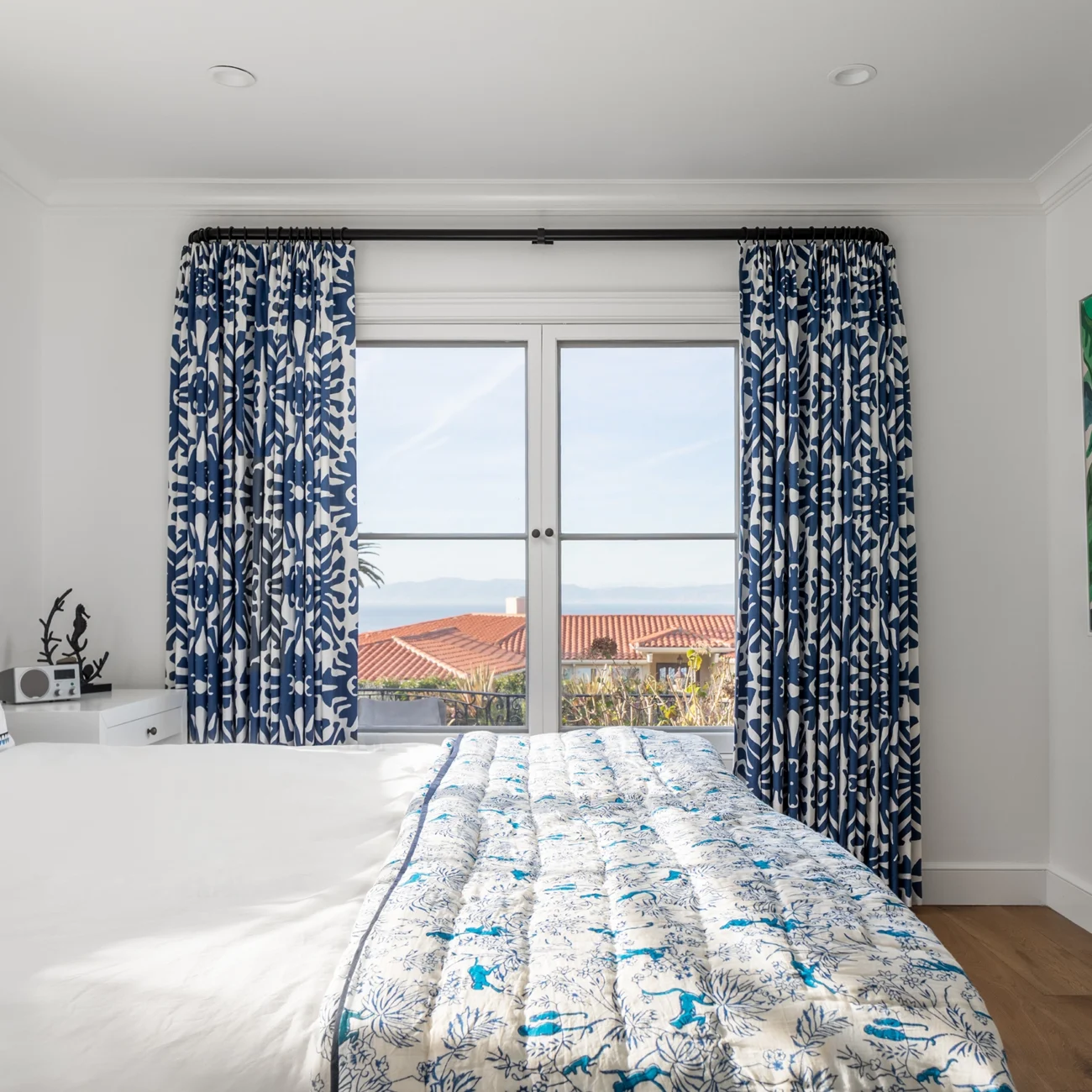 Christine Vroom Interiors | Via Arriba | Bright white bedroom with navy accents