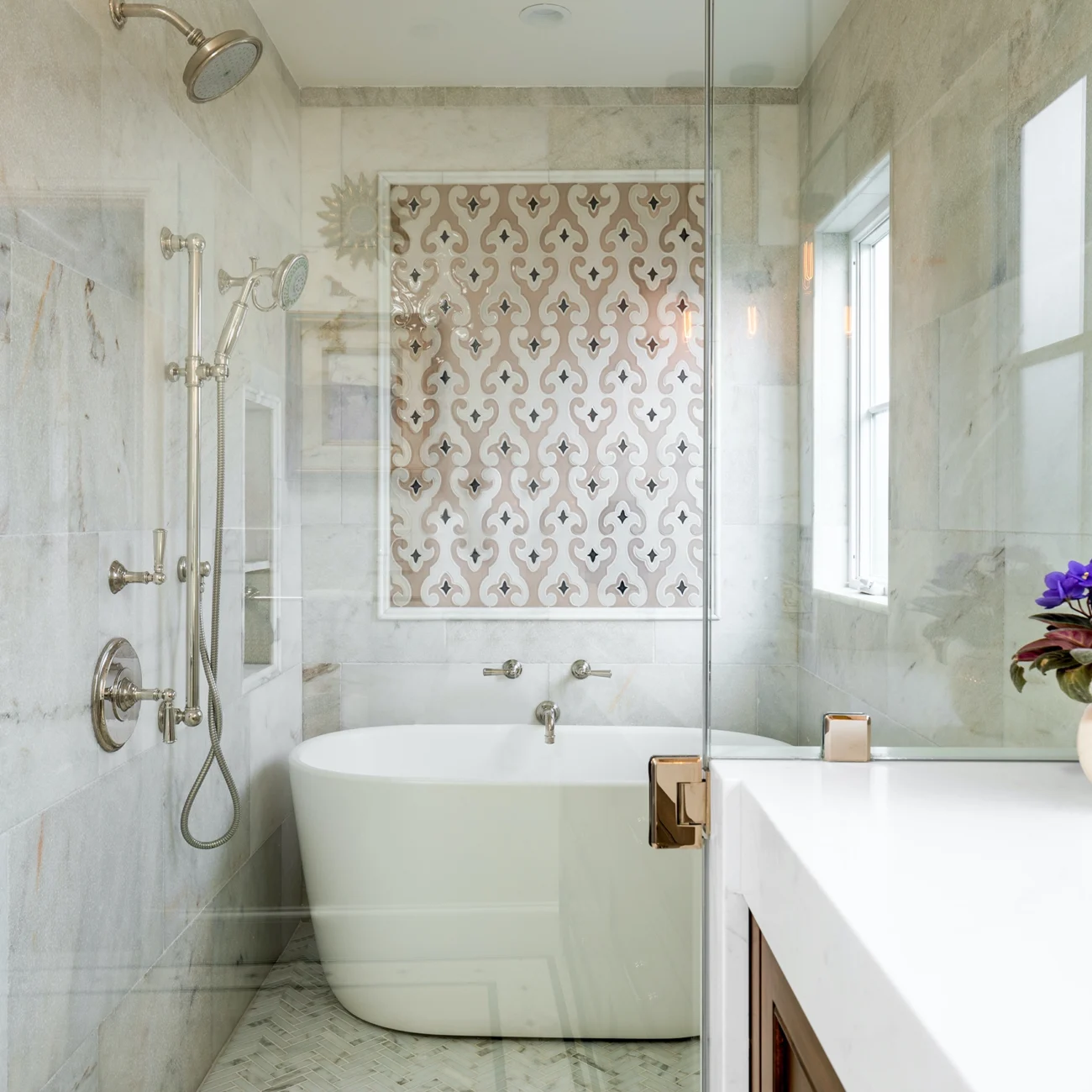 Christine Vroom Interiors | Via Arriba | Bright white bathroom with soaker tub and Spanish tile backsplash