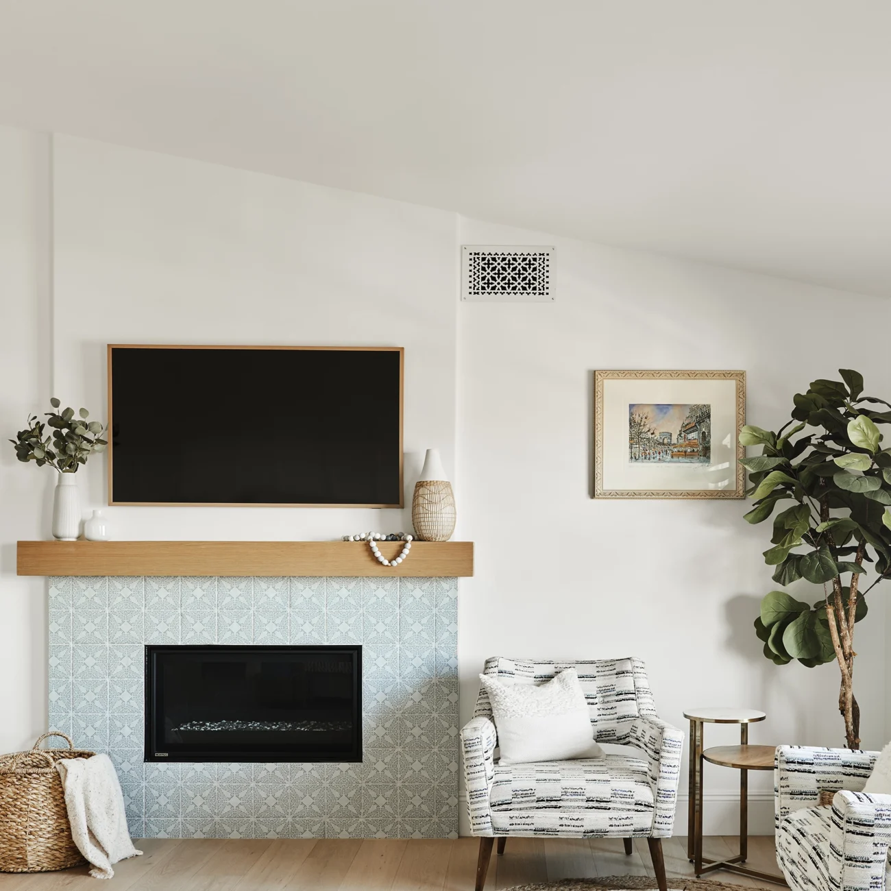Christine Vroom Interiors | Via Almar | Costal Bright bedroom with tiled fireplace