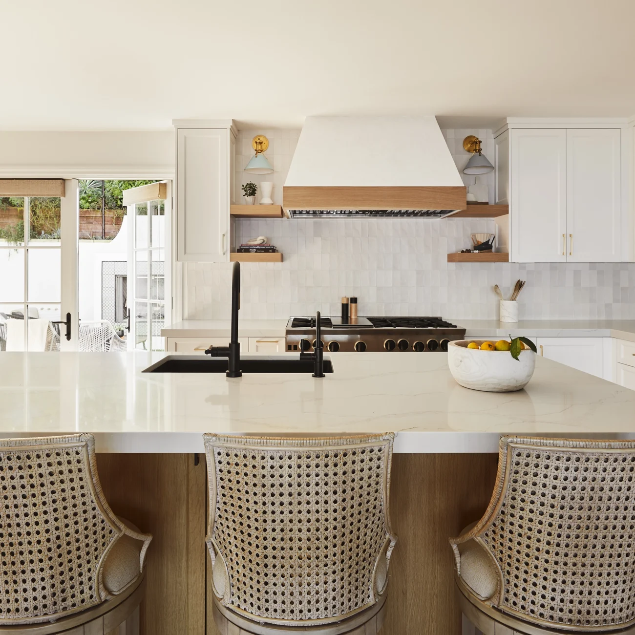 Christine Vroom Interiors | Via Almar | Costal Bright kitchen with waterfall Island
