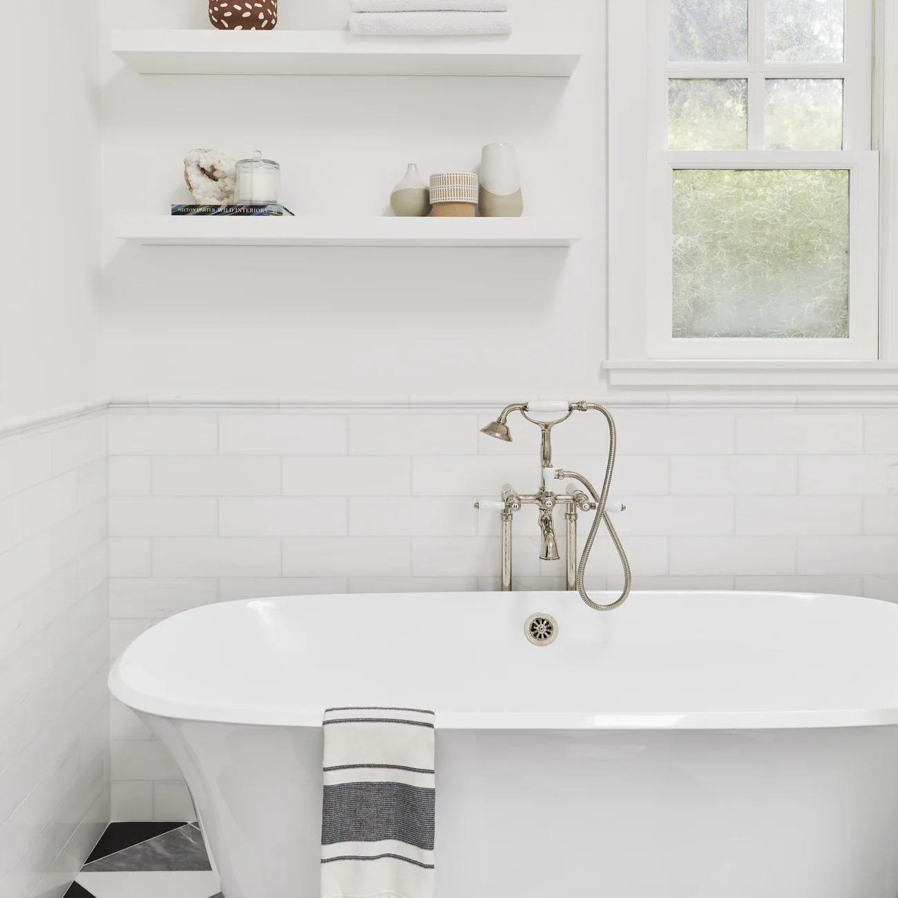 Christine Vroom Interiors | Marco | Modern white bathroom with soaker tub