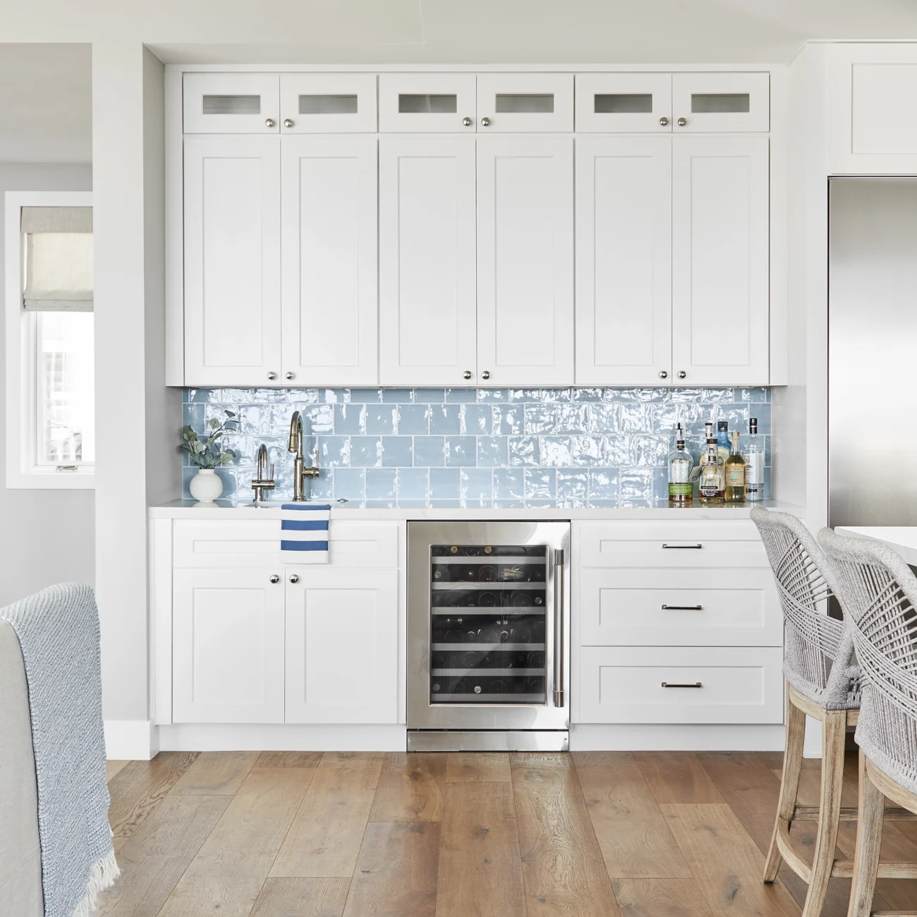 Christine Vroom Interiors | 27th | bright, costal kitchen with light blue backsplash