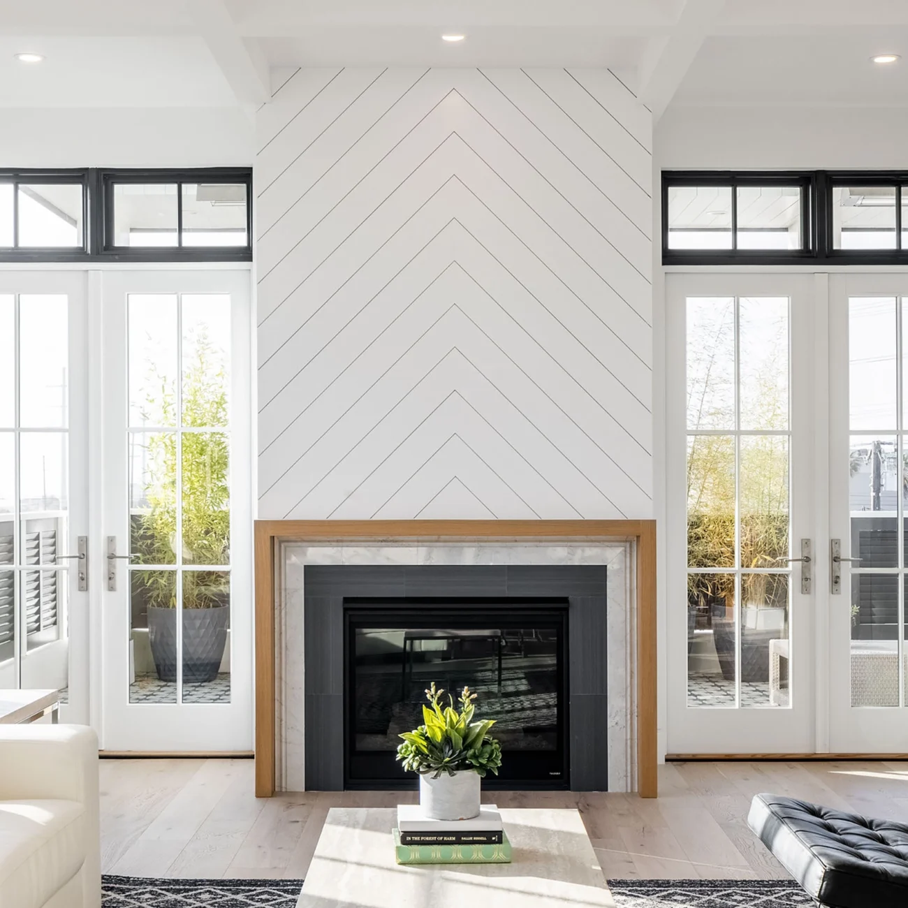 Christine Vroom Interiors | 36th | Costal, bright, white, living room with black accents and fireplace