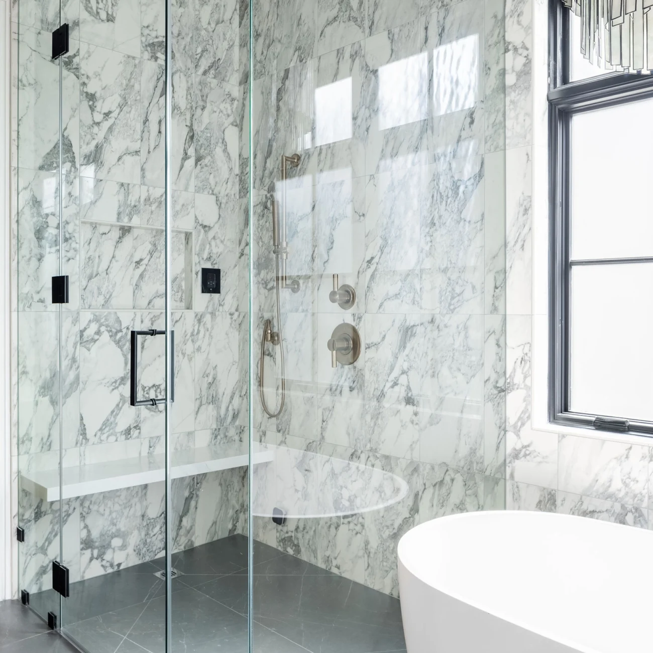 Christine Vroom Interiors | 36th | Costal bathroom with soaker tub and large glass shower