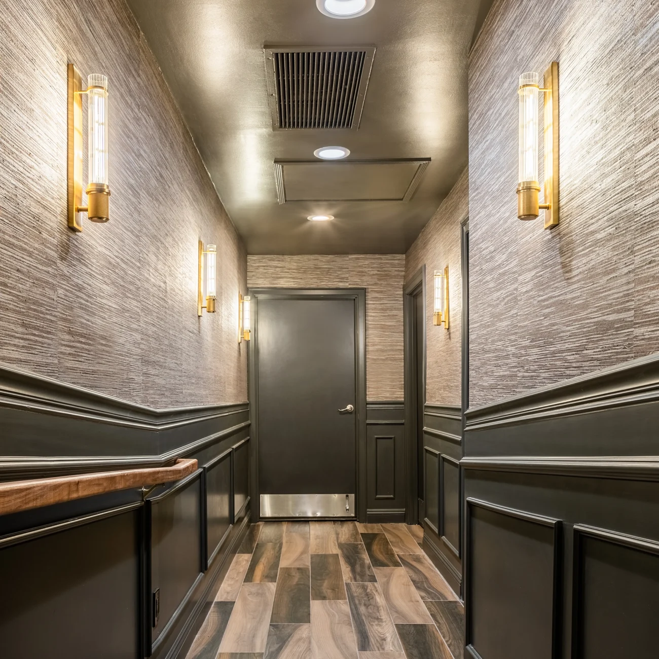 Christine Vroom Interiors Pacific Standard | Contemporary textured hallway with black wainscoting