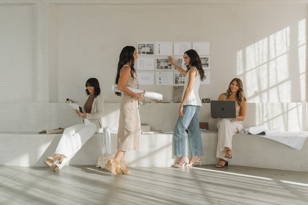 Christine Vroom Interiors Team works together on interior design projects